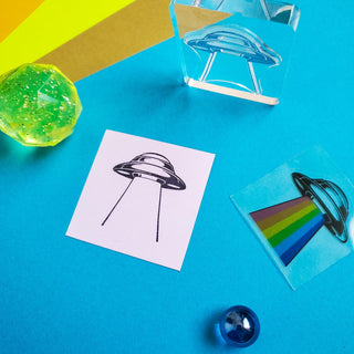 ufo rainbow rays stamp